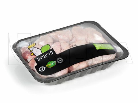 Упаковка разделки курицы в термоусадочную пленку на трейсилере