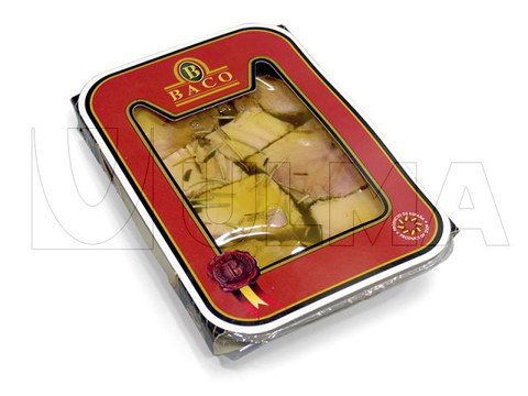 Упаковка кусочков тунца в масле на трейсилере