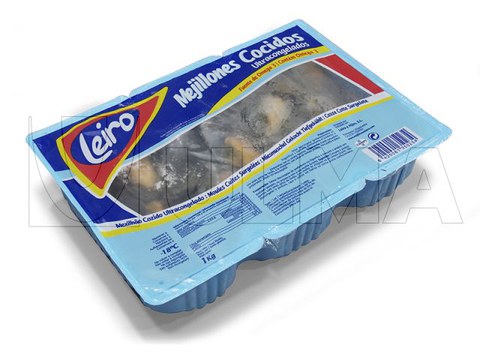 Упаковка замороженных вареных мидий на термоформере