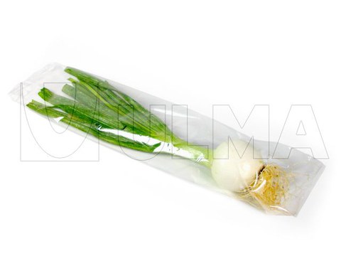 Упаковка репчатого лука на флоу-паке