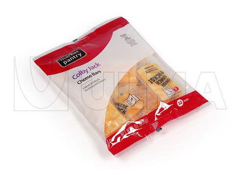 Упаковка кусочков сыра в ламинированную пленку на вертикальной машине